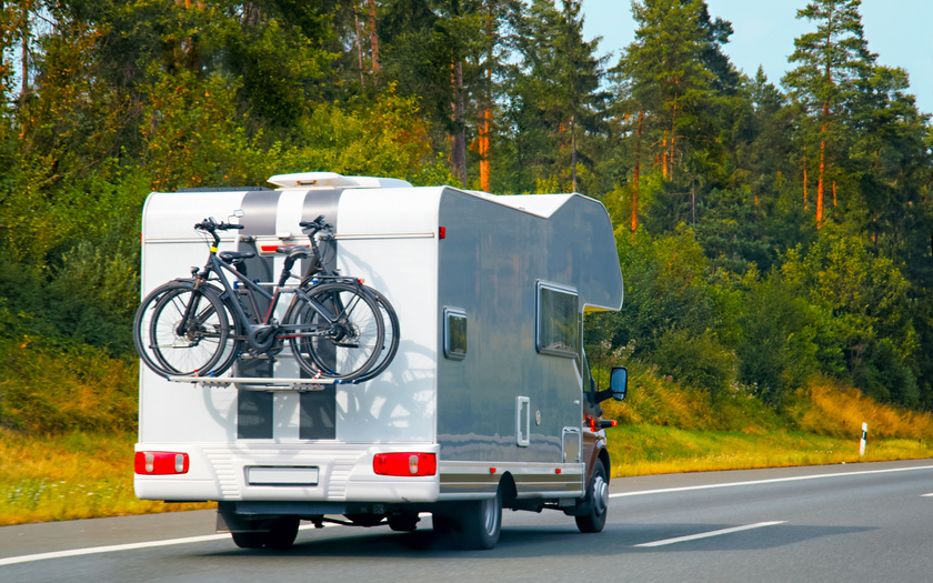 Camper with Bicycles on the Road