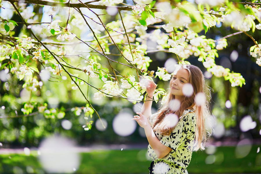 Girl in Cherry Blossom Garden 